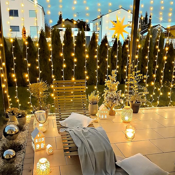 JMEXSUSS 900 LED Outdoor Christmas Curtain Lights, 9.5x29.5ft Christmas Lights Plug in with Remote, Twinkle Hanging String Light for Bedroom Wall Wedding Backdrop Window Gazebo Decor, Warm White