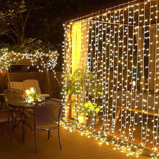 JMEXSUSS 300 LED Remote Control Christmas Curtain Lights, Plug in Fairy Curtain Lights Outdoor, Window Wall Hanging String Lights for Bedroom Backdrop Wedding Party Indoor Patio Xmas Decor, Warm White