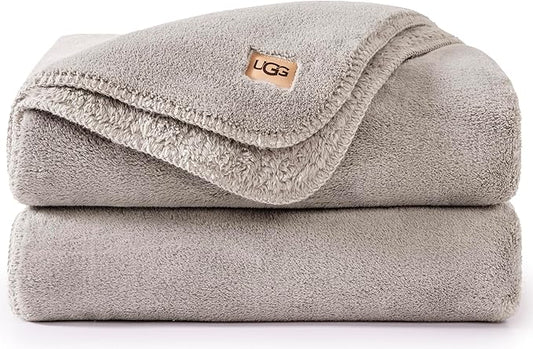 UGG Whitecap Plush Throw Blanket Fleece Lightweight Soft Throw for Couch or Bed Luxury Home Decor for Living Room Washable Hypoallergenic Blankets for Dorm Decor, 50-inch x 70-inch, Light Grey Seal